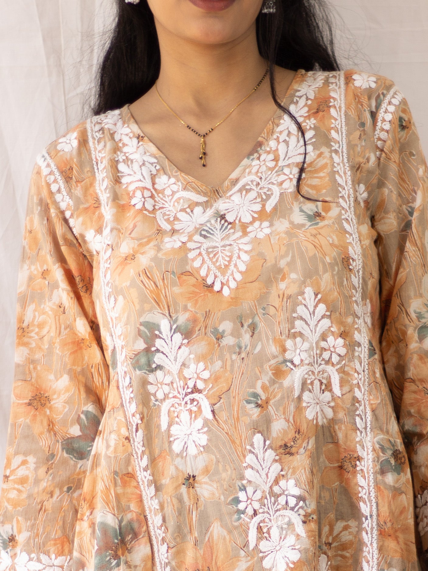 Fariyal Mulmul Printed Chikankari short kurti (Orange)