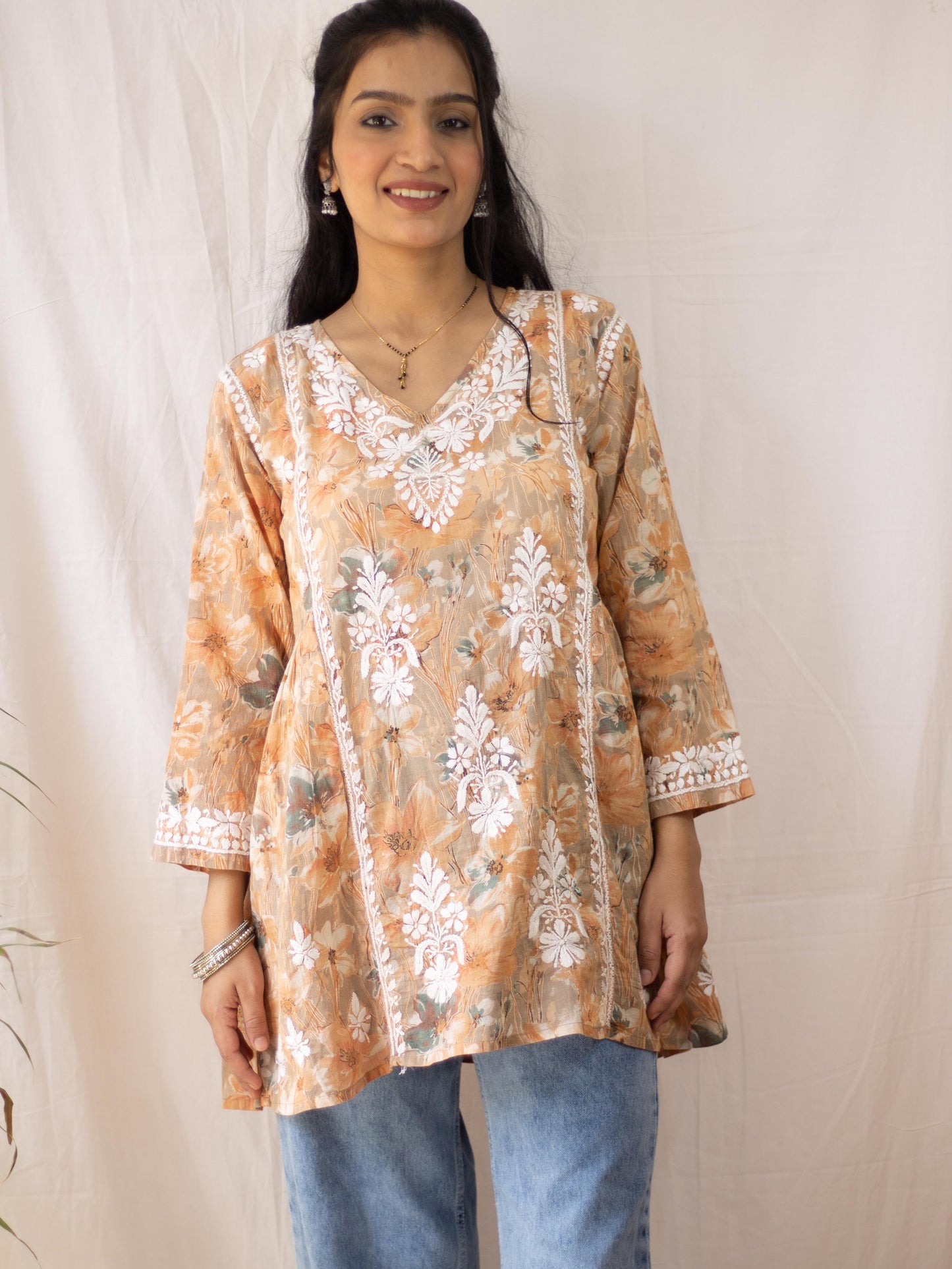 Fariyal Mulmul Printed Chikankari short kurti (Orange)