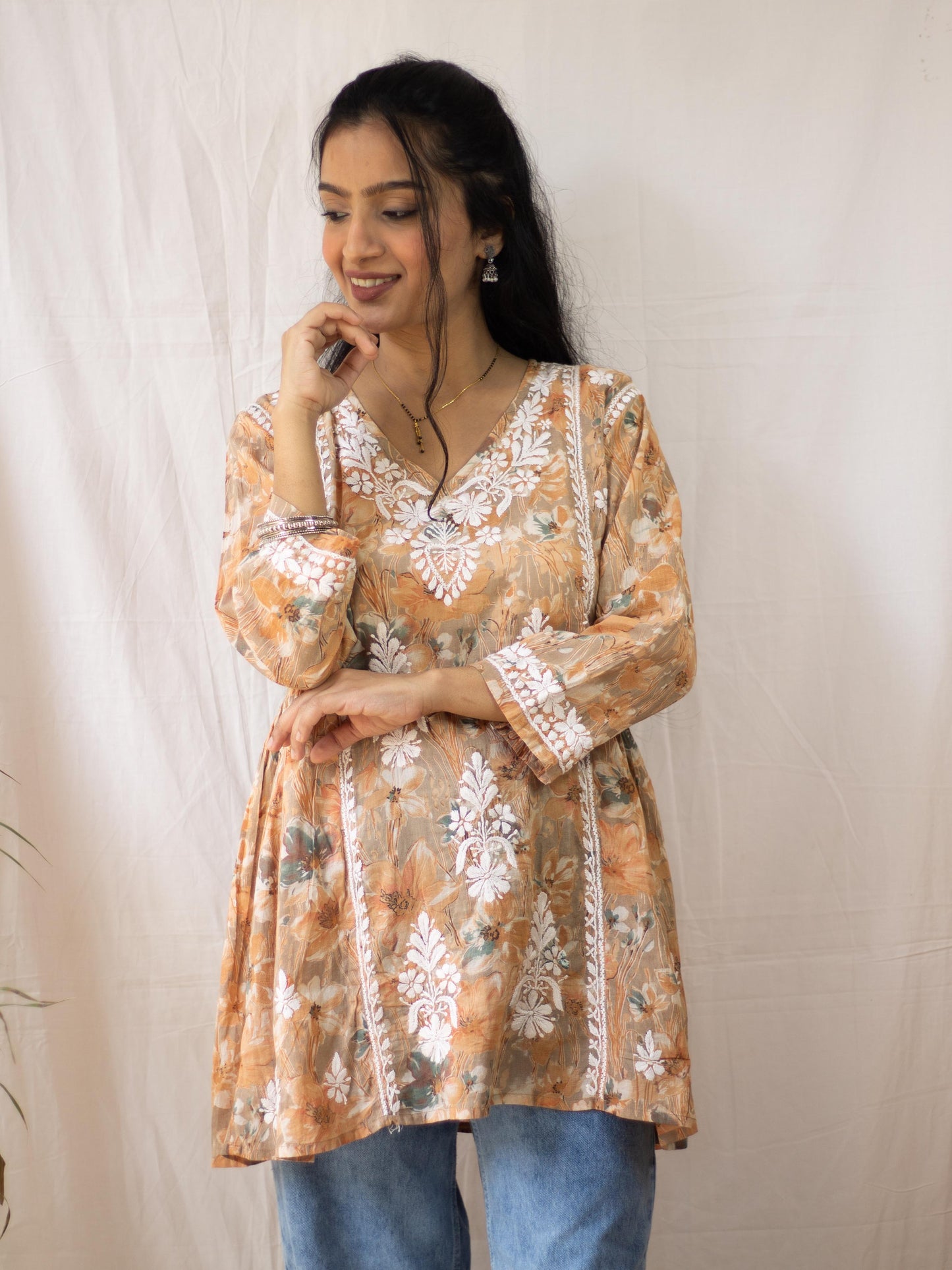 Fariyal Mulmul Printed Chikankari short kurti (Orange)