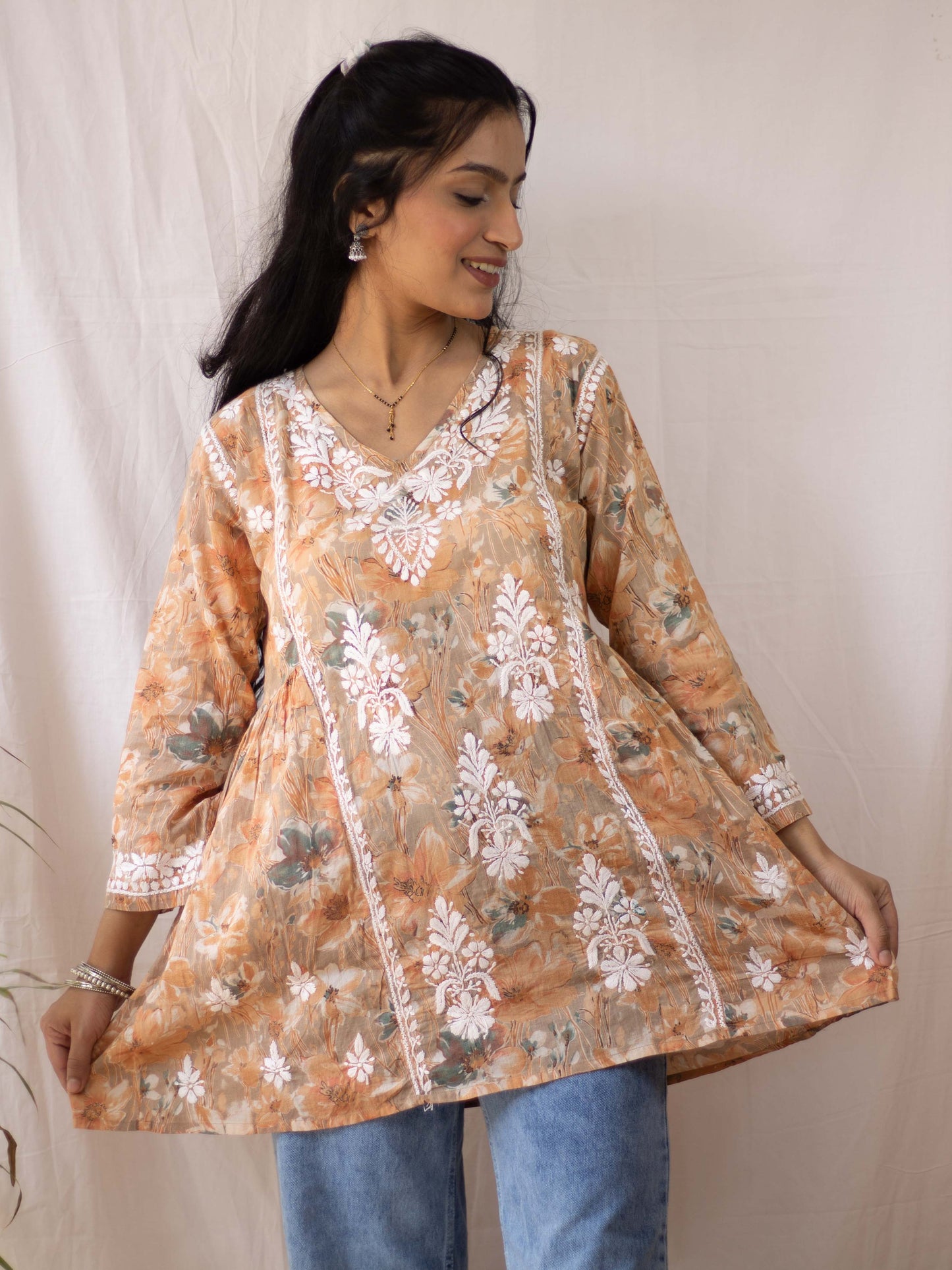 Fariyal Mulmul Printed Chikankari short kurti (Orange)