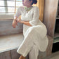 anam chikankari kurti white front sitting detail