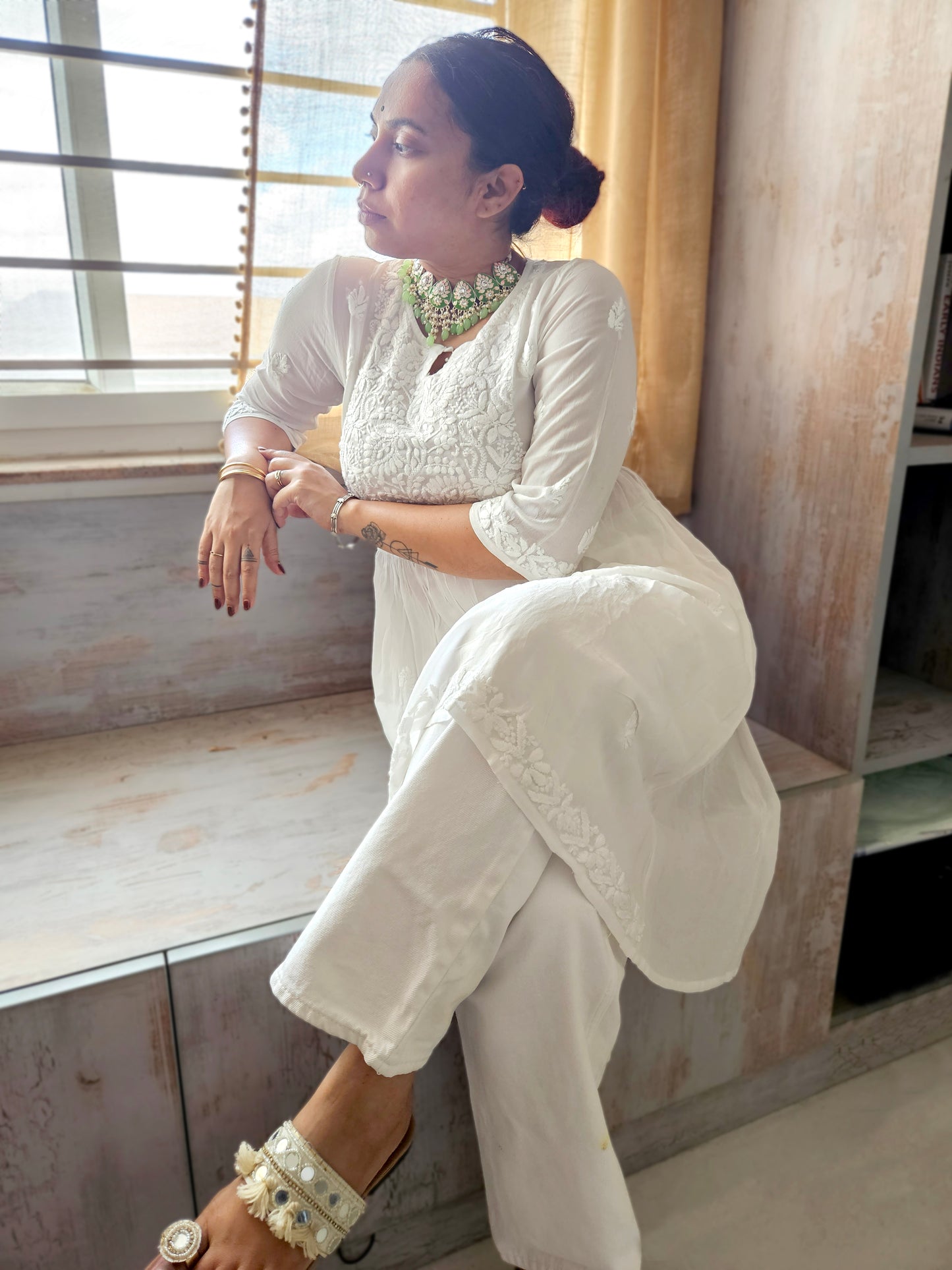 anam chikankari kurti white front sitting detail